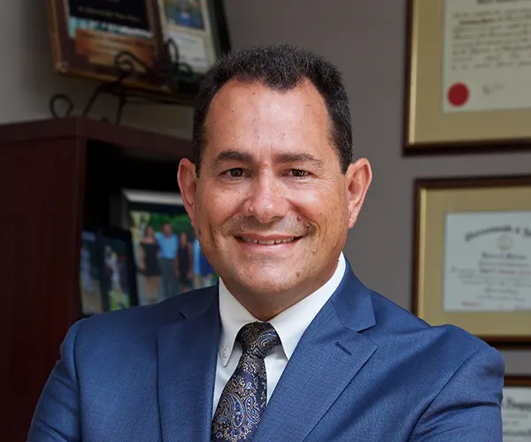 Dr. Mark E. Vasiliadis